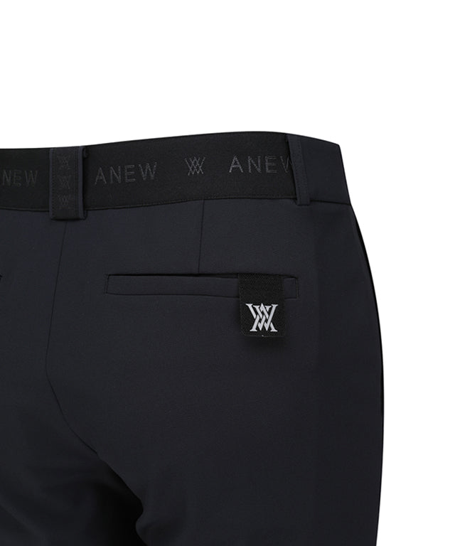 ANEW Golf Men Side Logo Point L/PT in Black, showcasing its stylish design and high-quality material.